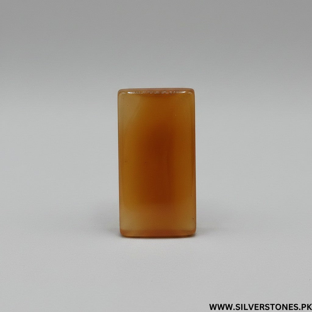 SilverStones.Pk rectangular orange Yamni Aqeeq stone, known for spiritual power and protection.