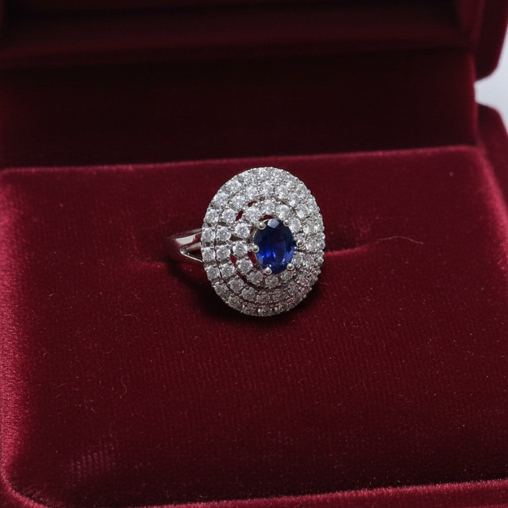 SilverStones.Pk oval imitation ring with blue zircon and clear stones, color silver, for women.