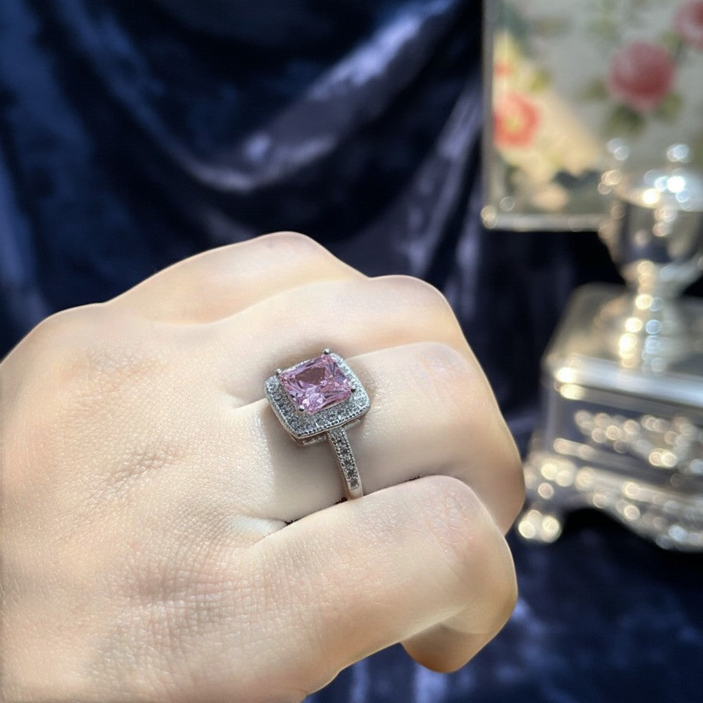 SilverStones.Pk pink zircon halo ring in 925 Italian sterling silver. Square cut center stone with pave band.