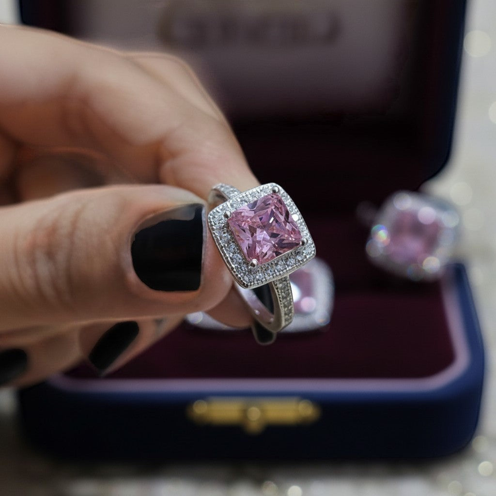 SilverStones.Pk pink zircon halo ring in 925 Italian sterling silver. Square cut center stone with pav
uevo accents.