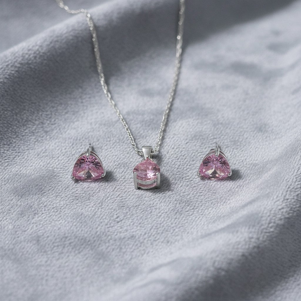 SilverStones.Pk pink pear-cut zircon pendant necklace and matching stud earrings set in sterling silver.