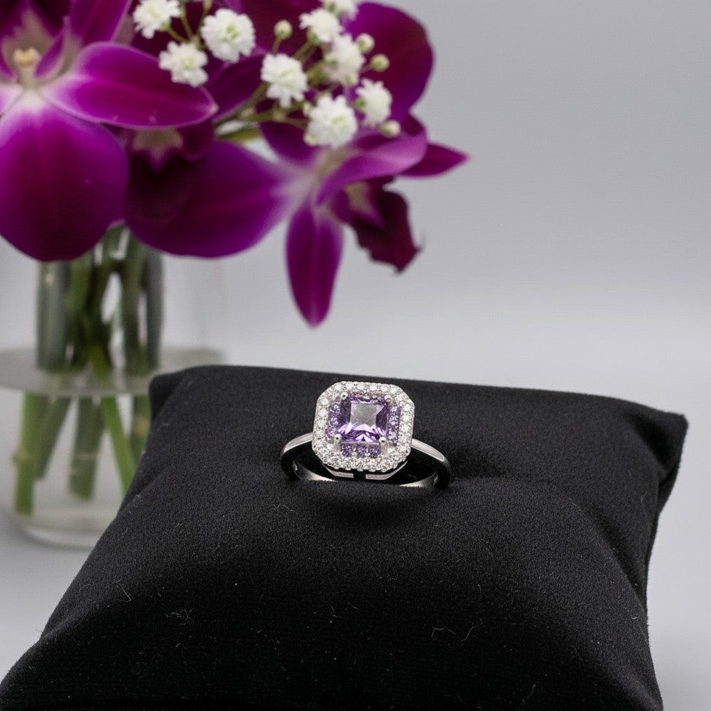 SilverStones.Pk purple zircon halo ring in 925 Italian sterling silver. Square cut center stone with pave set accents.