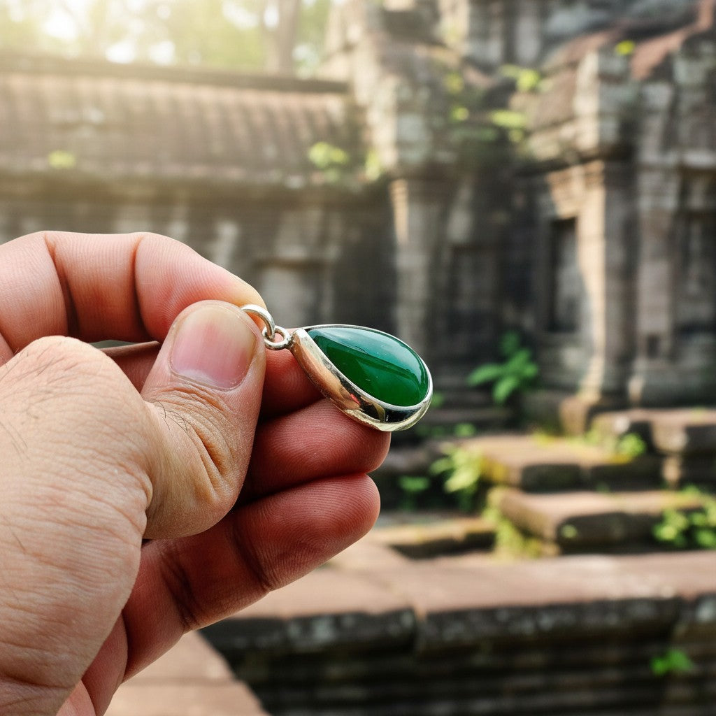 SilverStones.Pk Real Aqeeq pendant with a teardrop-shaped green stone set in silver.