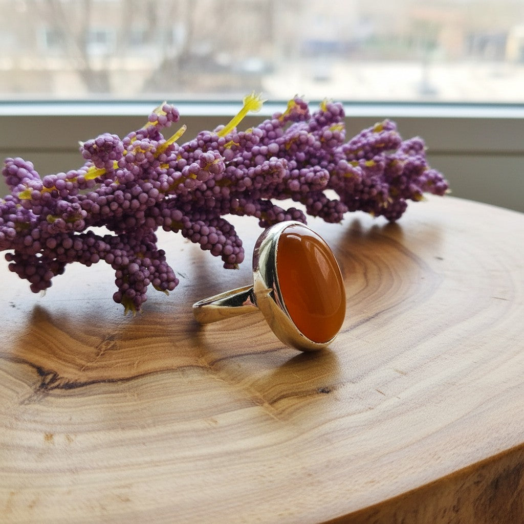SilverStones.Pk handmade oval real aqeeq gemstone ring in warm orange, set in polished silver.
