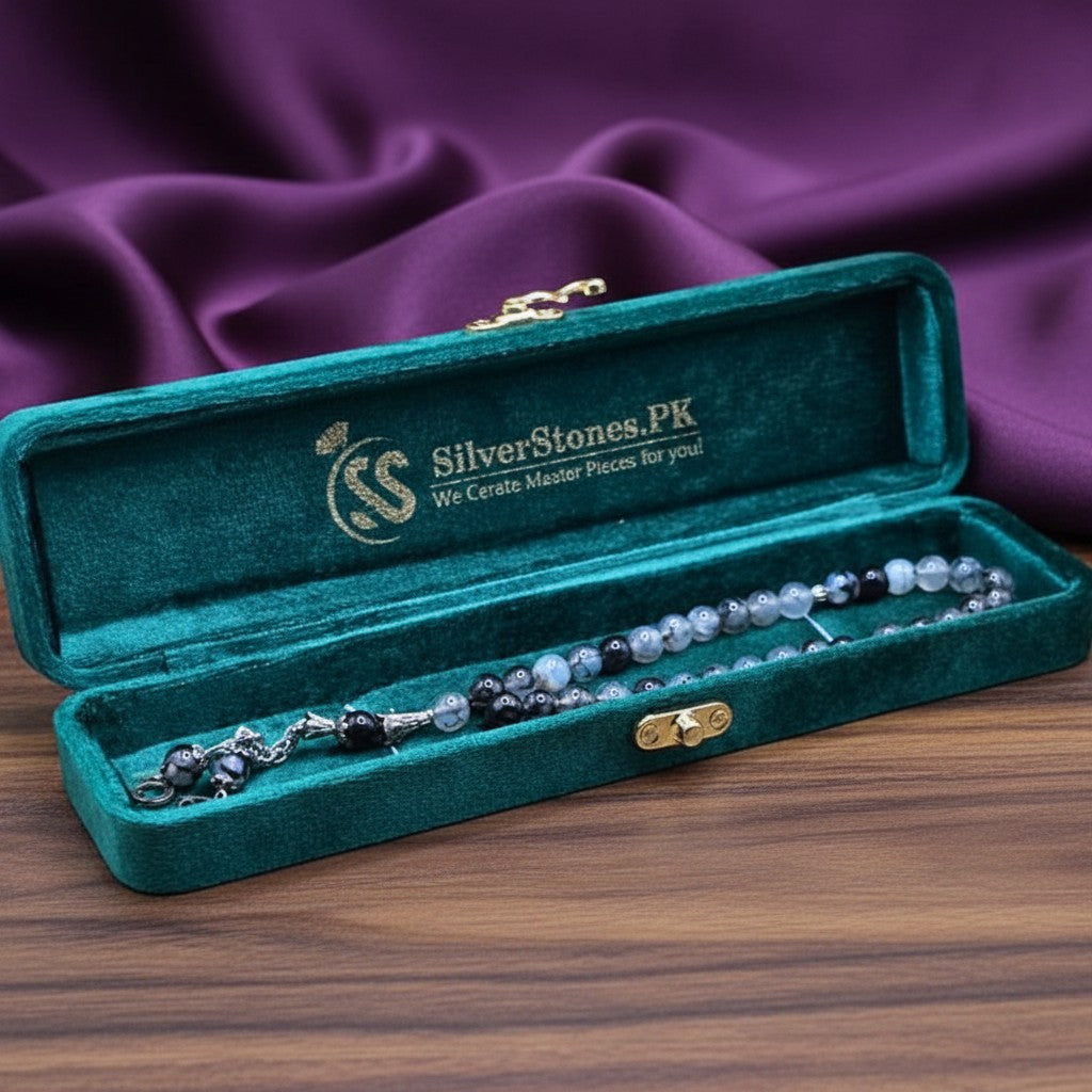SilverStones.Pk real Shajri Aqeeq stones tasbeeh in a green velvet box. Grey and black polished beads with silver accents.