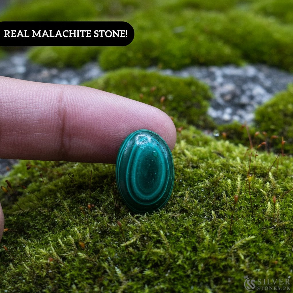 SilverStones.Pk oval real malachite stone with vibrant green swirls, believed to aid kidney health.
