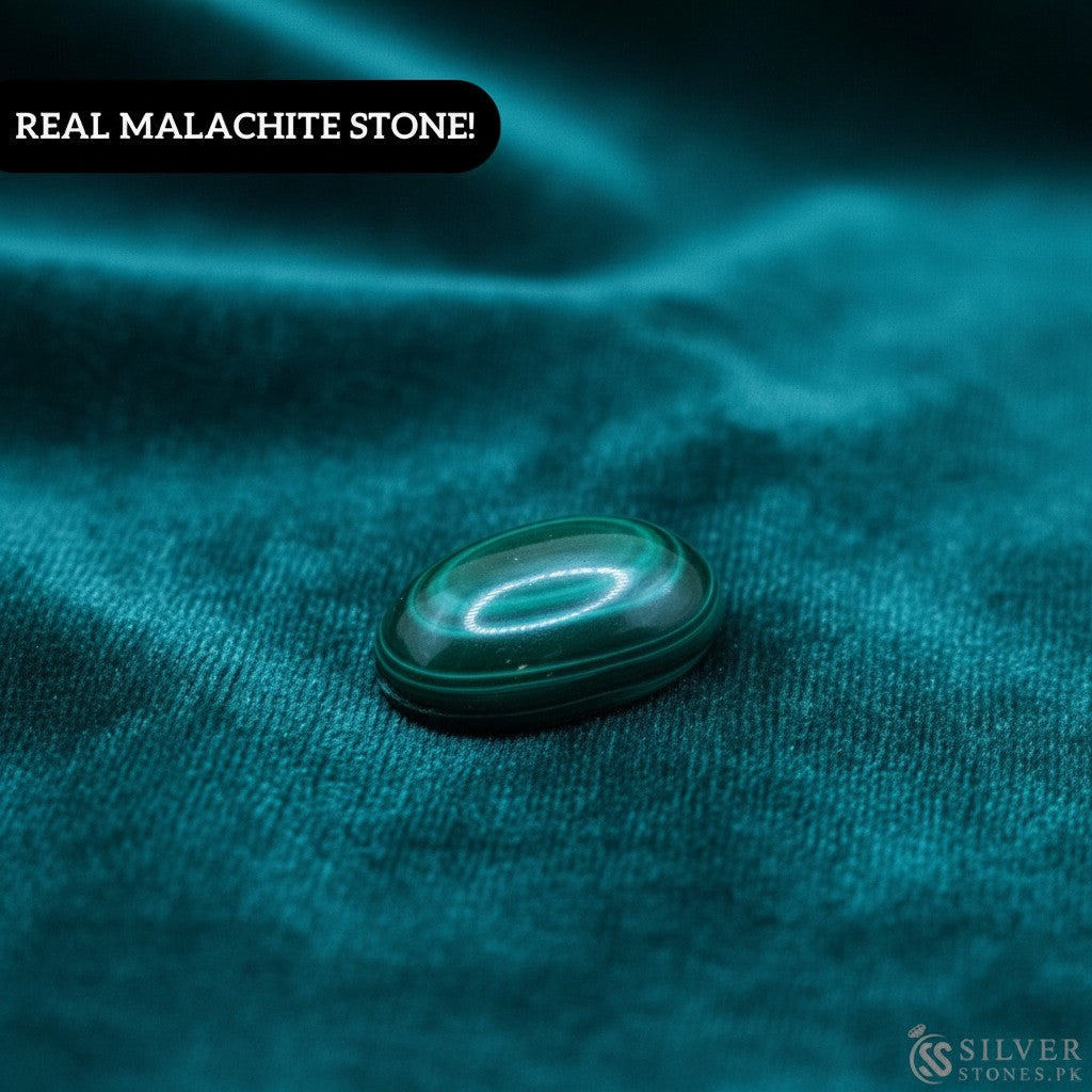 SilverStones.Pk oval polished real malachite stone with vibrant green swirls, believed to aid kidney health.