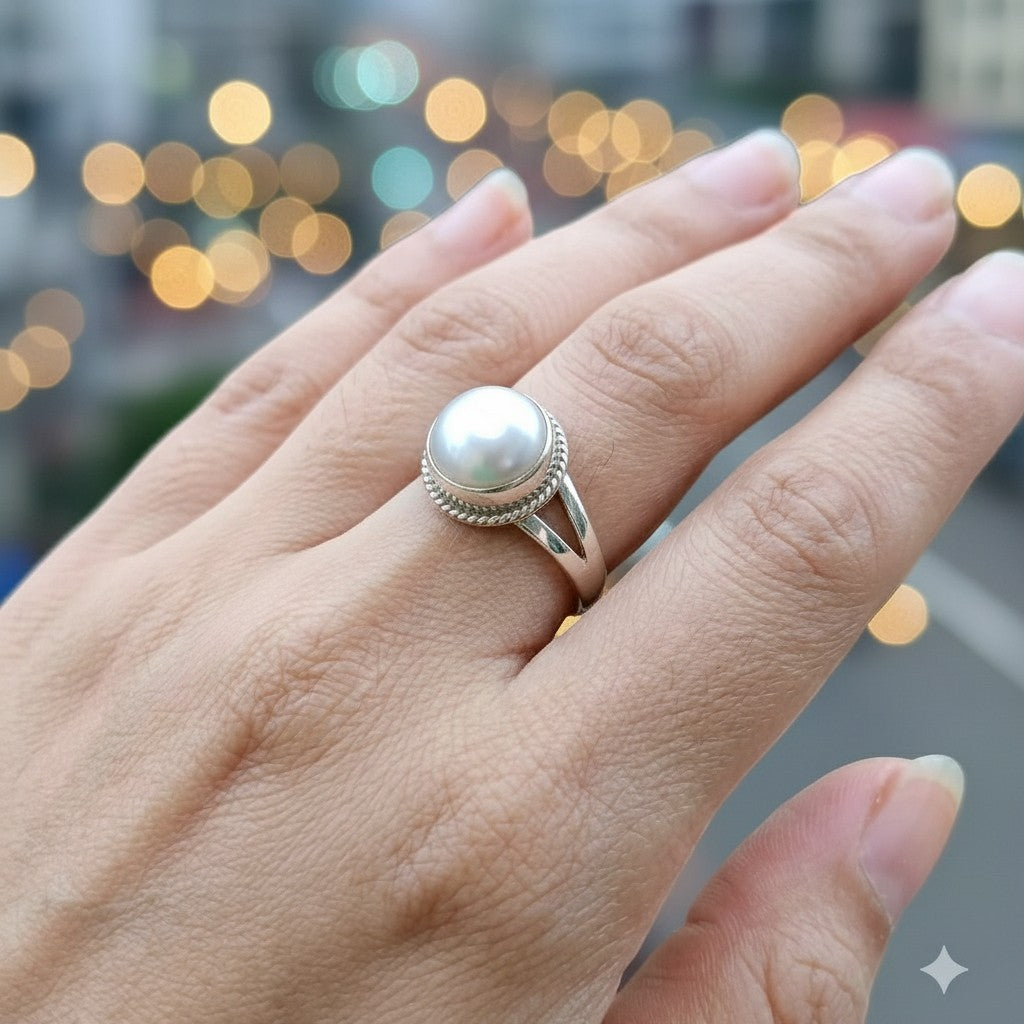 SilverStones.Pk handcrafted sterling silver ring with a real natural pearl center, featuring a split band design.