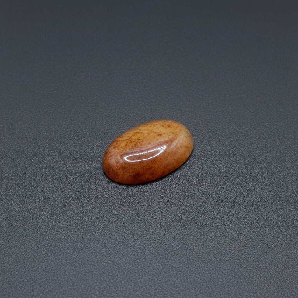 SilverStones.Pk oval cabochon real Sulemani Aqeeq stone, warm orange-brown with natural banding, 4.40 grams.