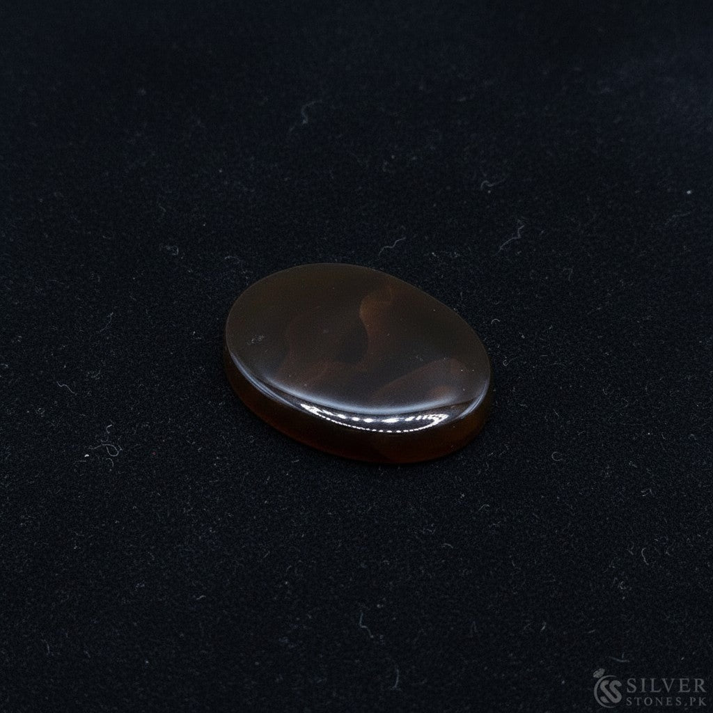 SilverStones.Pk real Sulemani Aqeeq stone, oval cabochon, deep brown with natural banding, 4.10 grams.