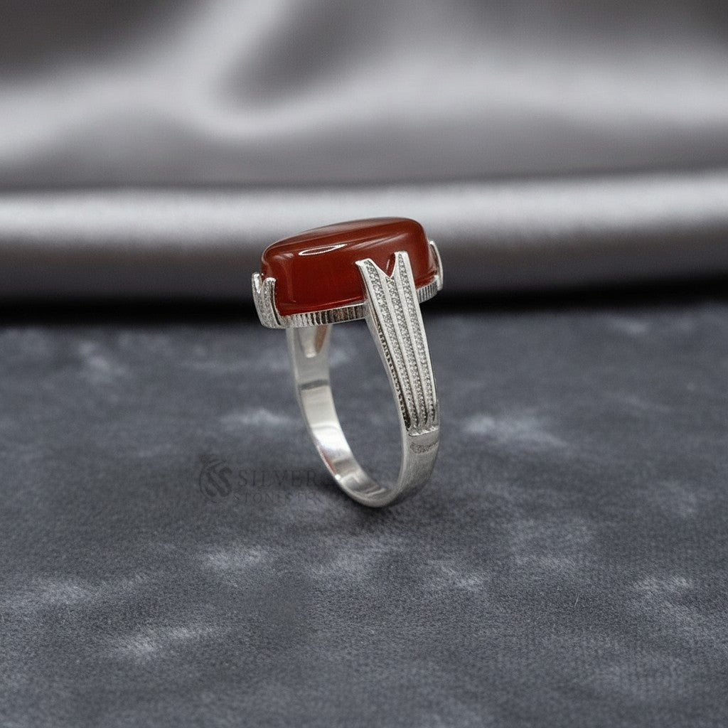 SilverStones.Pk handmade ring with a large oval red aqeeq gemstone set in sterling silver with textured band.