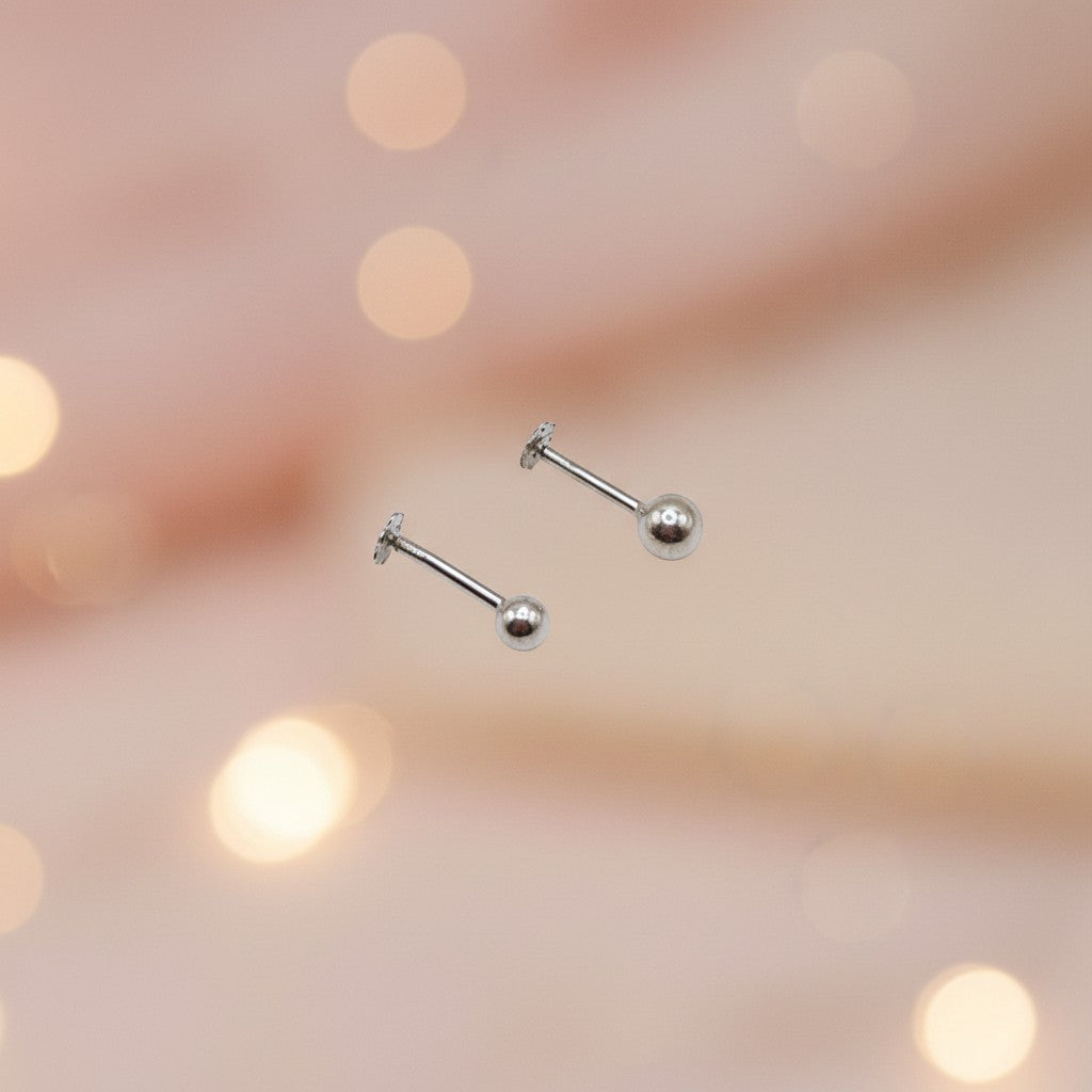 SilverStones.Pk authentic silver nose pins with a sleek ball design and secure backing, perfect for everyday wear.