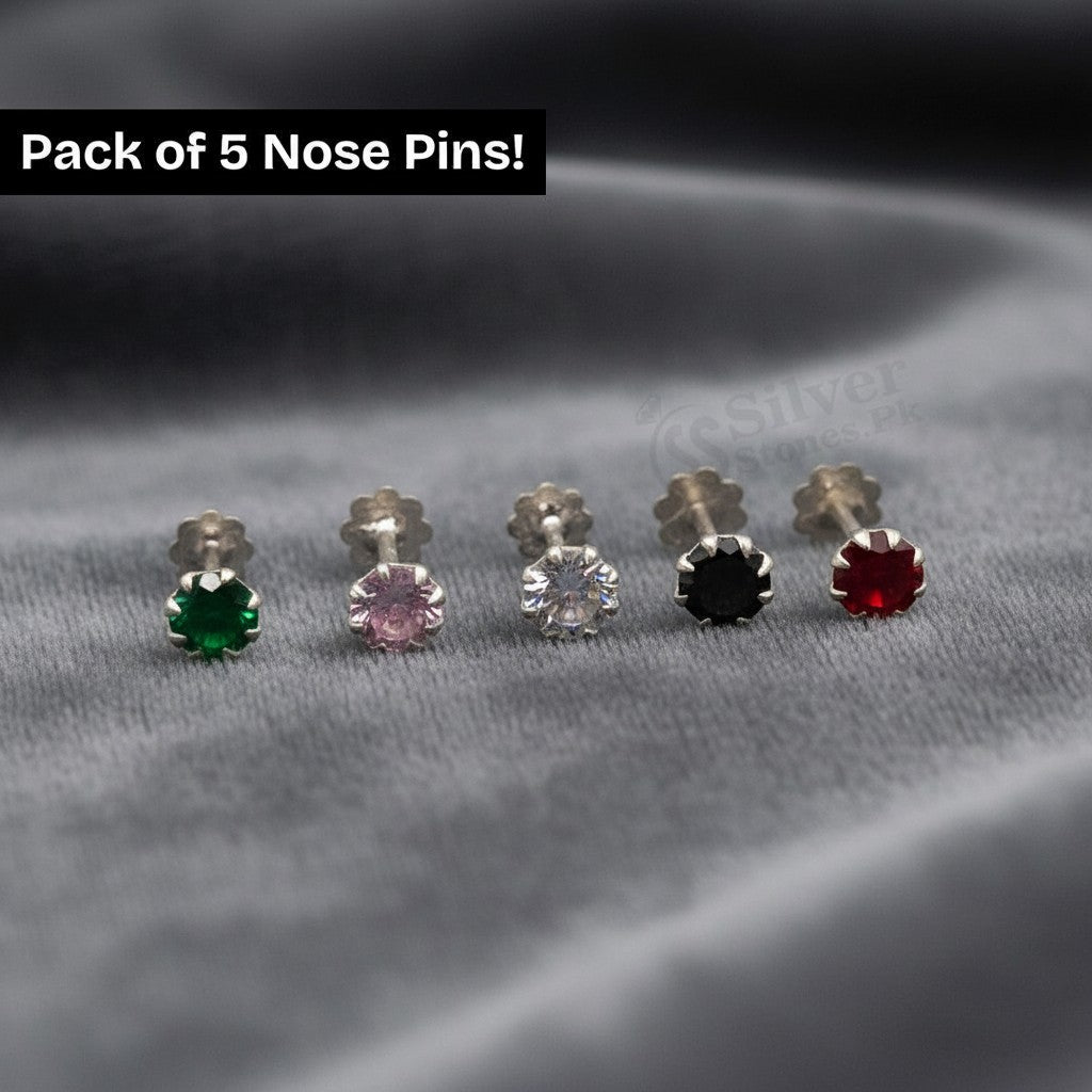 SilverStones.Pk pack of 5 sterling silver nose pins with green, pink, clear, black, and red zircon stones.