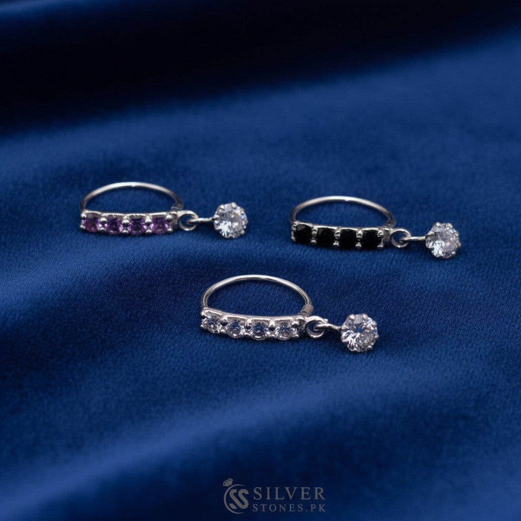 SilverStones.Pk silver nose ring with clear zircon stones and a dangling clear zircon. 10mm size.