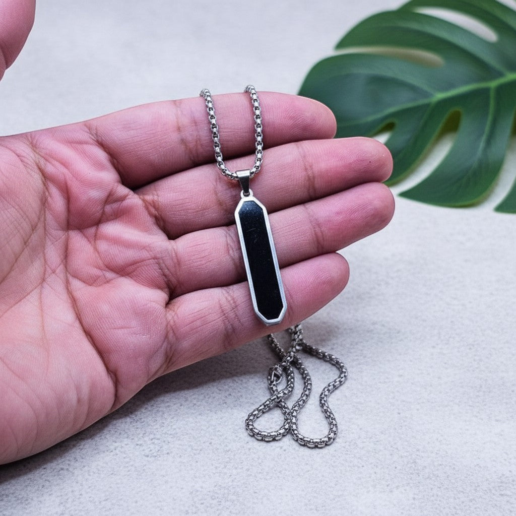 SilverStones.Pk men's stainless steel pendant with black inlay and box chain. Durable, stylish, and versatile for any occasion.