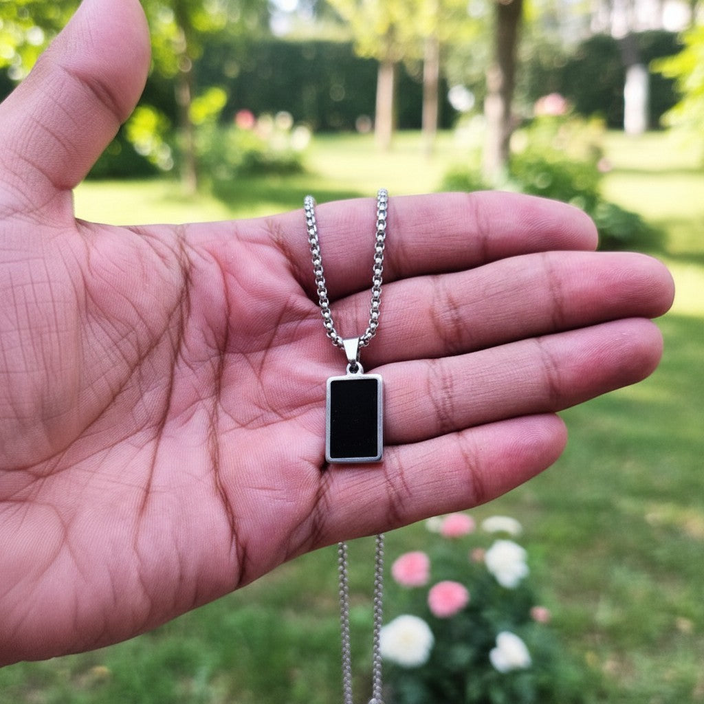SilverStones.Pk men's rectangular stainless steel pendant with black inlay and curb chain.