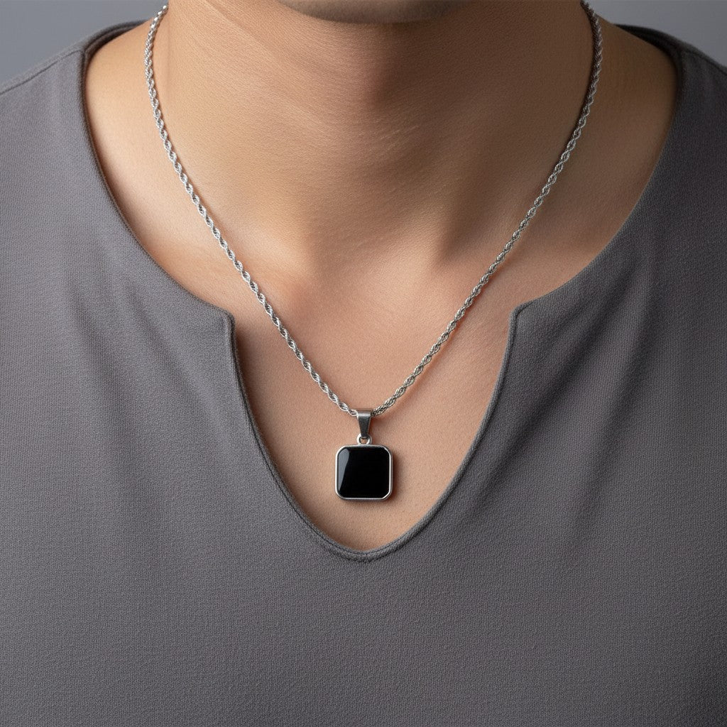 SilverStones.Pk men's stainless steel pendant with black inlay on a rope chain. Durable and stylish.