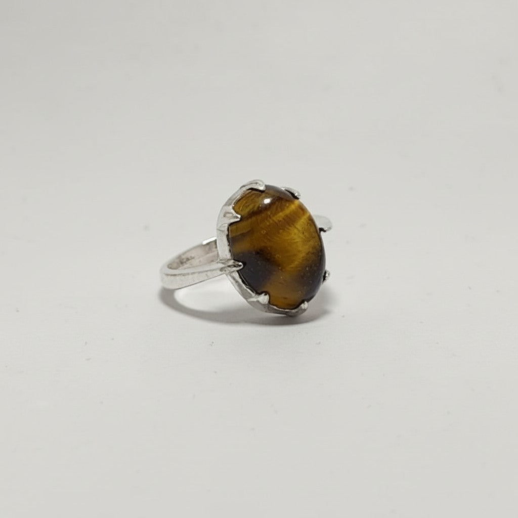 SilverStones.Pk ladies ring with oval tiger eye stone set in a silver band. Handmade Chandi silver.