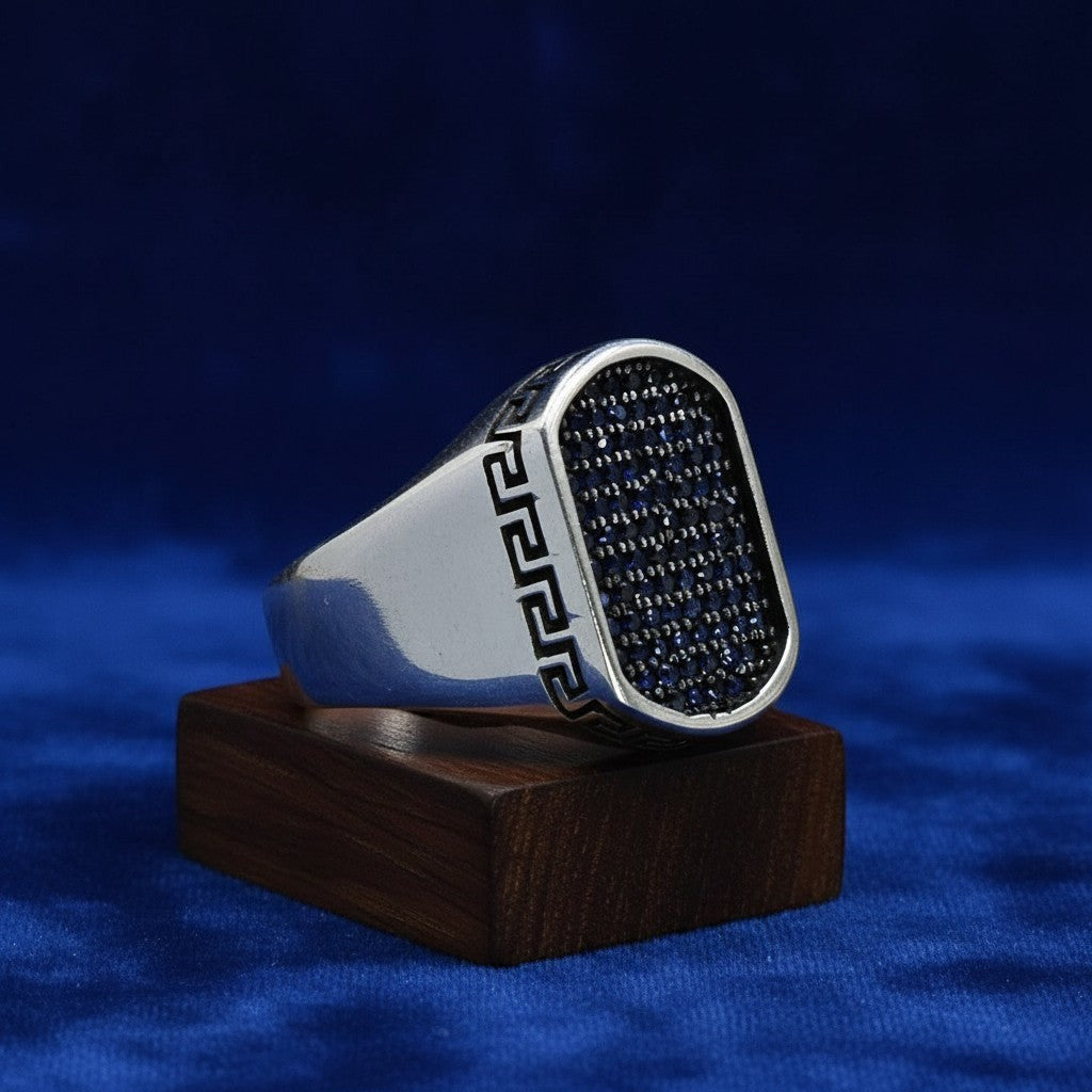 SilverStones.Pk Turkish 925 sterling silver gents ring with blue zircon stones and Greek key design.