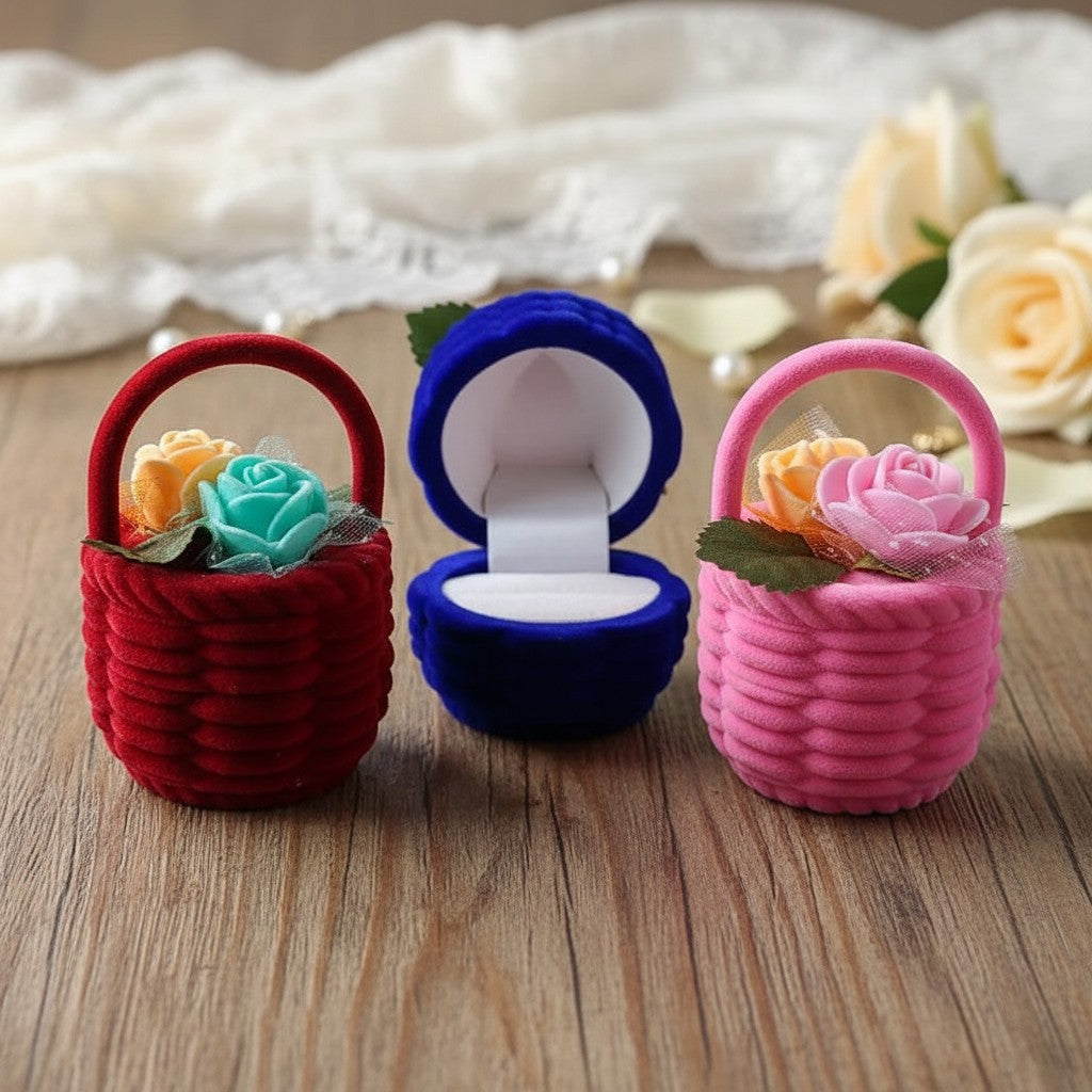 SilverStones.Pk red, blue, and pink velvet ring boxes with floral accents. Open blue box displays white satin lining.