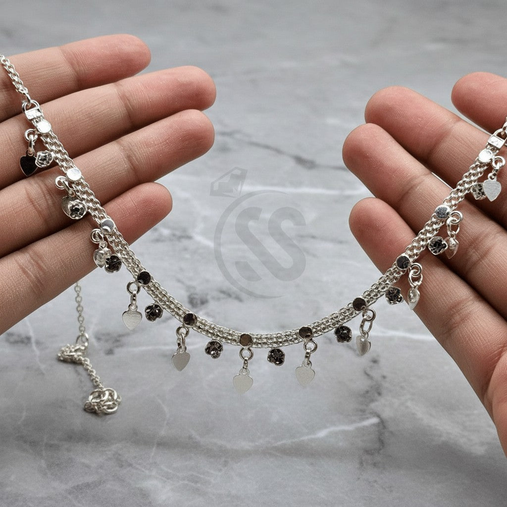 SilverStones.Pk vintage Turkish style pure silver necklace with zircon stones and dangling heart charms.