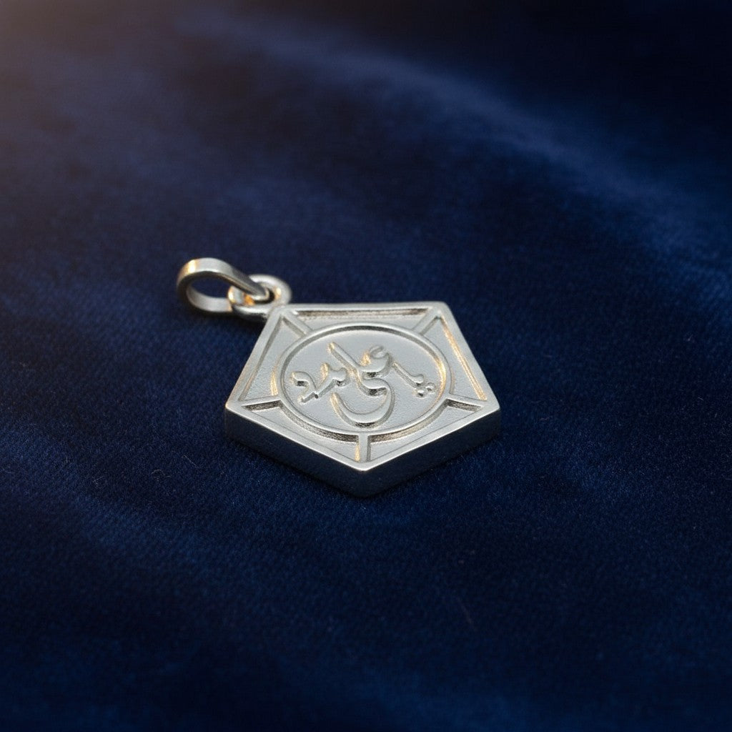 SilverStones.Pk Ya Ali pendant in sterling silver, featuring Arabic calligraphy inscribed within a pentagonal frame.