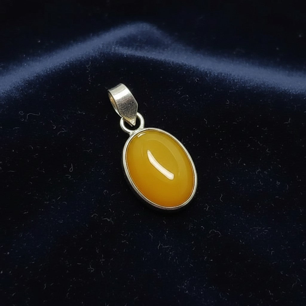 SilverStones.Pk oval yellow aqeeq gemstone pendant with silver setting.