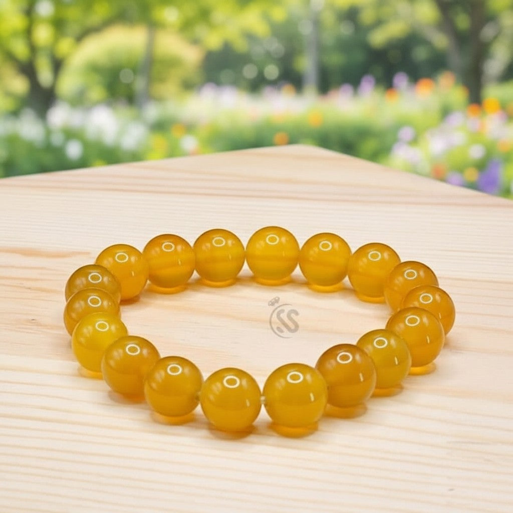 SilverStones.Pk yellow aqeeq stone beaded bracelet with polished finish.