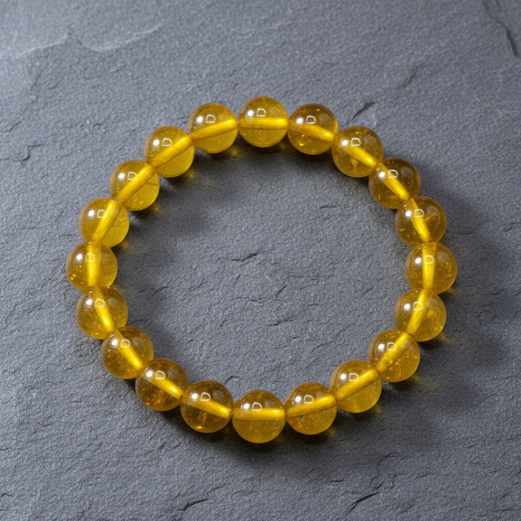 SilverStones.Pk yellow aqeeq stone beaded bracelet with natural variations.